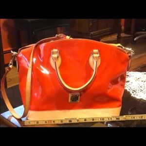 Orange Dooney and Bourke patent leather purse